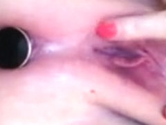 Plug in my asshile while fucking my pussy with a dildo