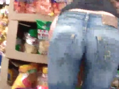Butt & ass in blue jeans shopping