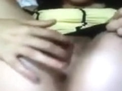 Webcam girl fingering her hairy twat