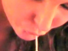 Busty amateur sucking pecker