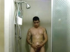 Sexy latino showering with hard cock