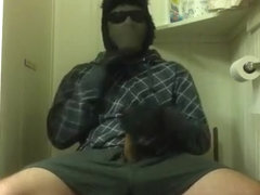 Jerk-off in hood, jacket, and gloves 9