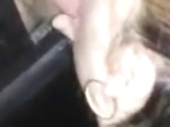 Wife slurps on 2 cocks in the gloryhole booth
