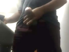 MILKING HIS BIG UNCUT BRAZILIAN DONKEY DICK AT WORK