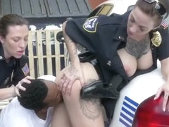 Milf cops subdue criminal against the car hood into stripping clothes off