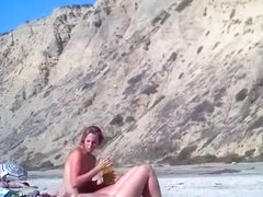 2 girls make fun with a guy's microdick on a nudist beach