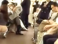 Japanese girl exposing part of buttocks in the train