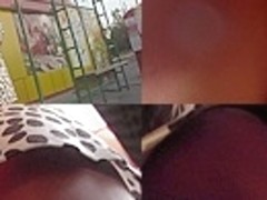 Brown-haired girl in A-line skirt filmed on upskirt cam