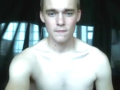 Stunning lad in blue wanking his big dick