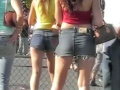Street candid with young bimbos in short jeans skirt
