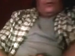 Fat guy soaks shirt with cumshot