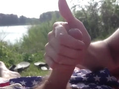 Girl Is Handling Cock By The River