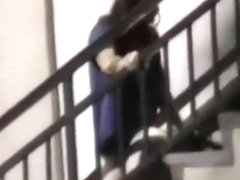 Voyeur tapes a couple having sex on public stairs outside
