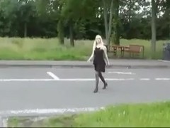 Naughy blonde teases strangers in public