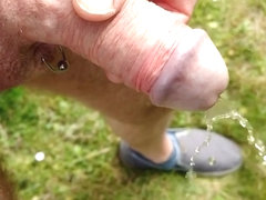 Slow motion piss outdoors