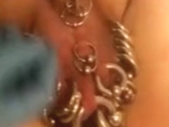 Pierced slavedick getting 5 piercings