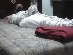 All tied up in white pajamas