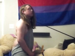 Sensually sucking small strapon