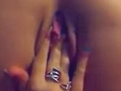 Sexy brunette girl spreads ass