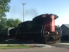 a C40-8 leads a short manifest thru Robins, IA