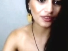 A hot girl showing her boobs on webcam.