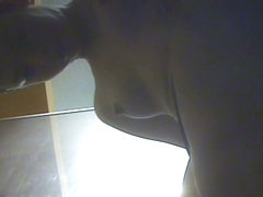 Dressing in change room amateur flashes tits and beaver