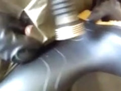 Another rubber poncho wank