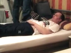 Taskmaster trampling in Nike Shox NZ on daybed