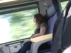 Guy plays with his cock in the train
