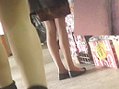 Sweetie in high heels in the escalator upskirt scene