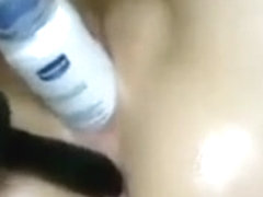 Sticking Various Objects In Her Pussy