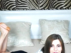 Barefoot cam girl in pose