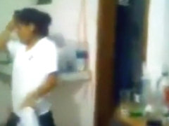 Naughty asian girl lets a friend suck her tit