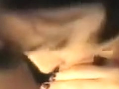 Brunette Woman Enjoys Licking Lollipops That Are Sweet