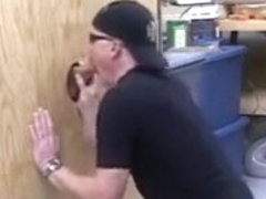 Nasty guy enjoys cock sucking through gloryhole