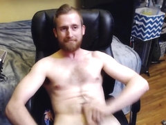 NAKED STUD WIT BEARD JERKS BIG UNCUT DICK TO ORGASM WITH CUM ON HAIRY CHEST