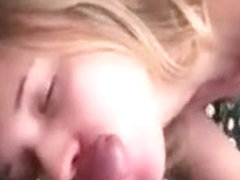 She gets sprayed with cum